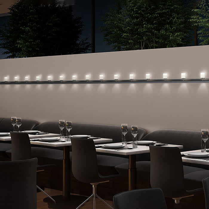 Votives™ LED Wall Light in dining room.